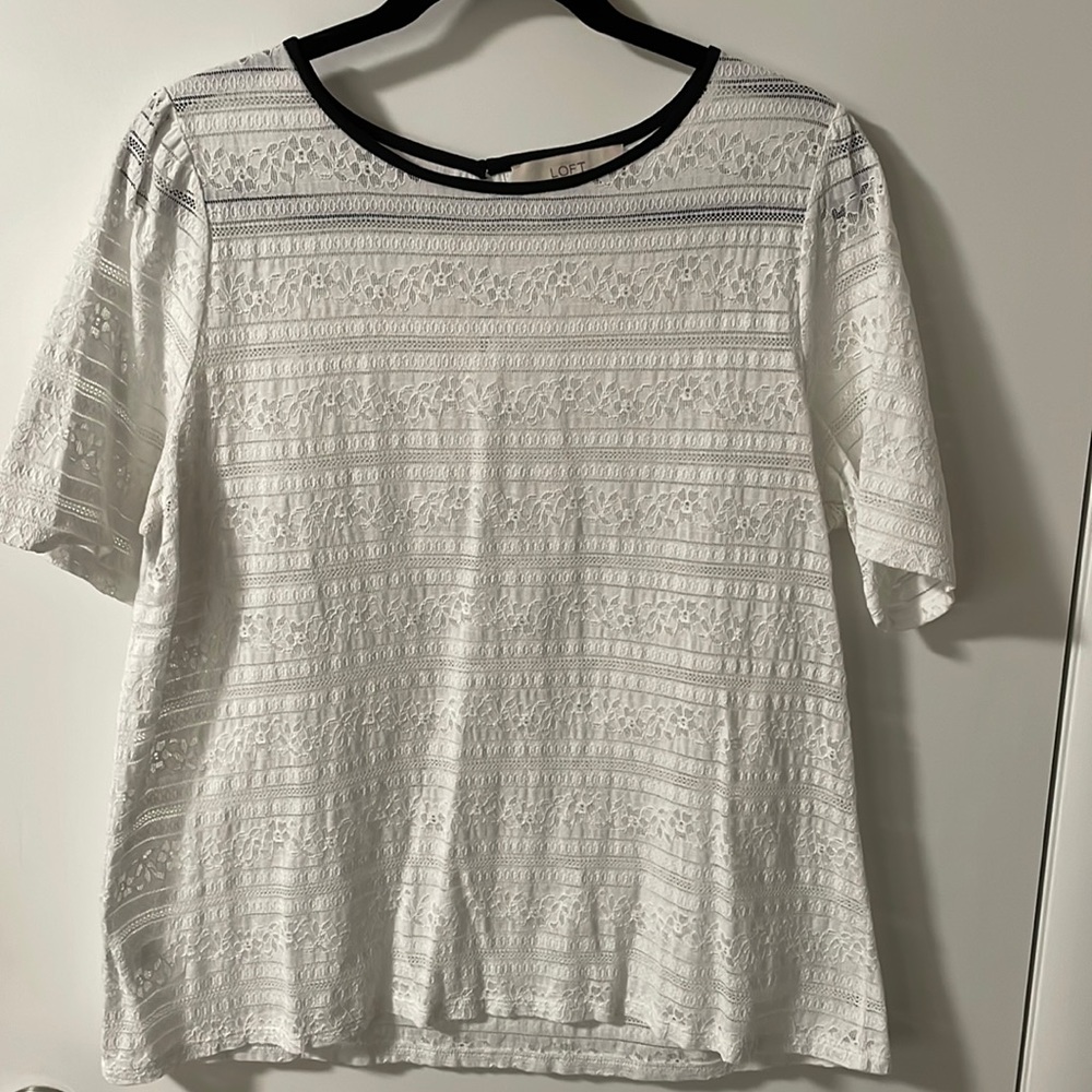 EUC lace top with black neck trim.